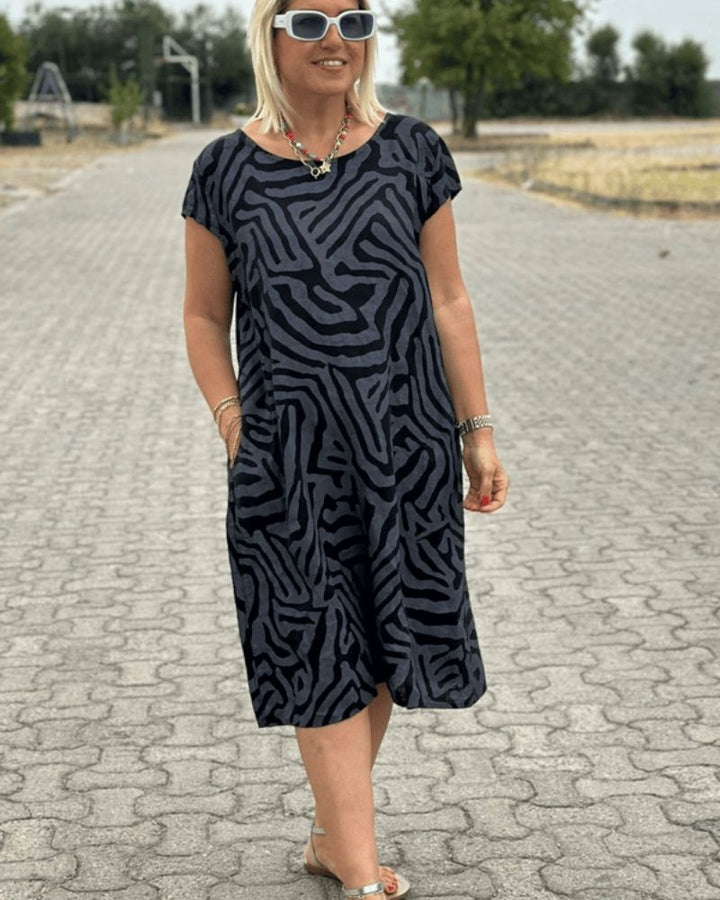 QUORINA | RELAXED MIDI DRESS WITH ROUND NECKLINE